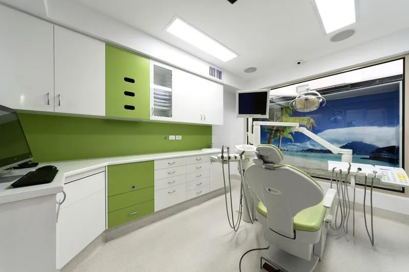 A calm, bright Magical Smiles treatment room with a window outlook.