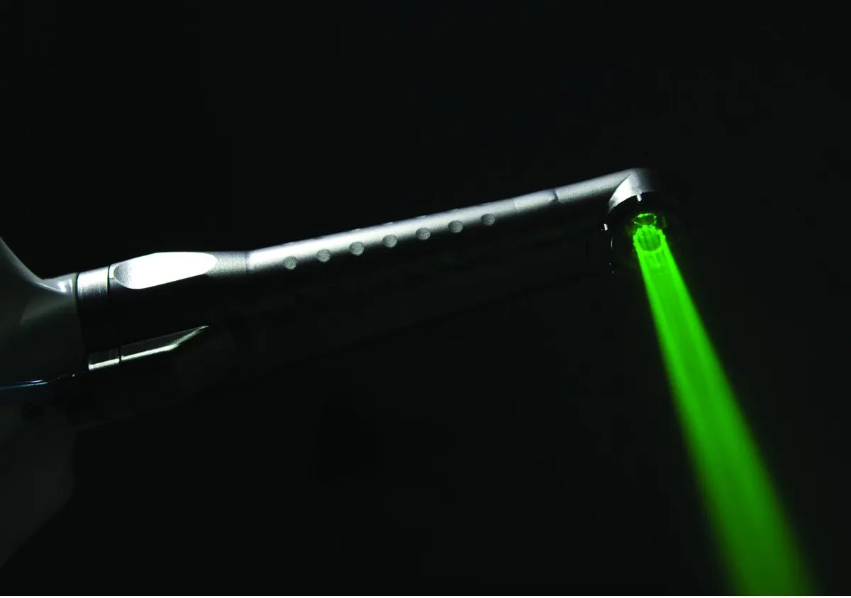 Fotona LightWalker green pilot beam emerging from the laser handpiece