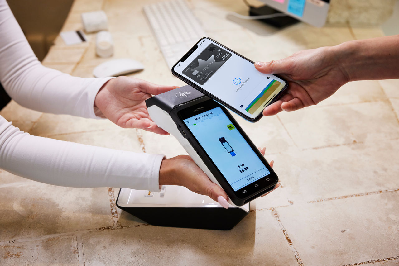 A HICAPS terminal processing an on-the-spot health fund claim at reception
